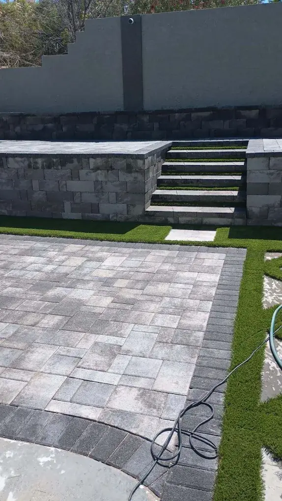 Paver patio with steps and turf border