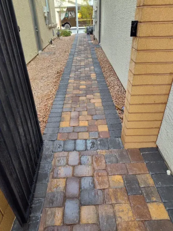 Narrow side yard paver walkway