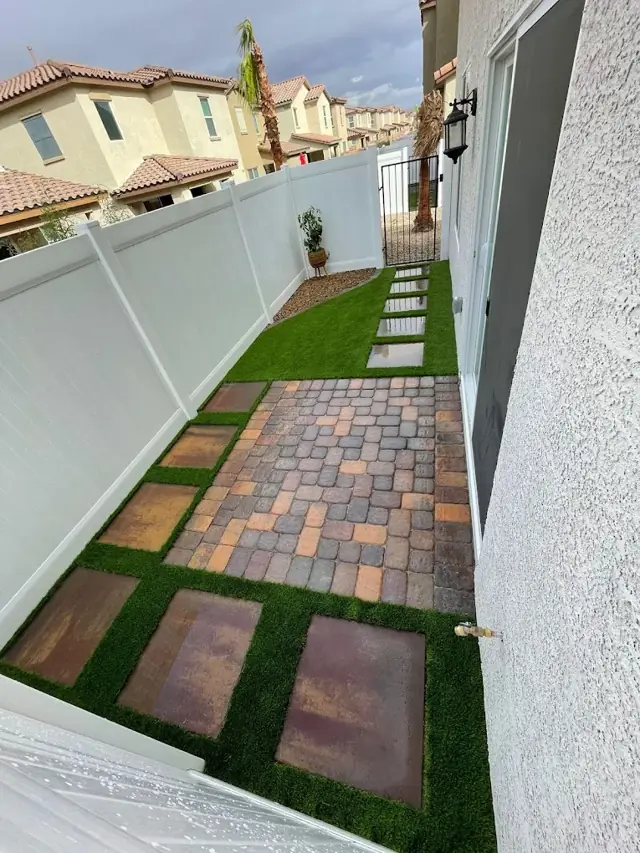 Side yard pavers with artificial turf inlay
