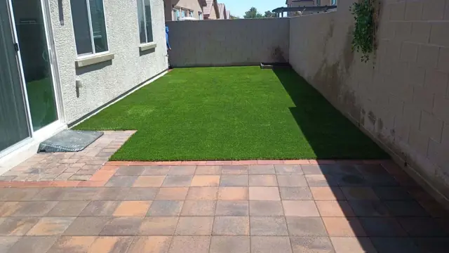 Artificial turf and paver patio